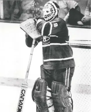  ?? THE CANADIAN PRESS FILES ?? Former Canadiens goaltender Ken Dryden rests on his stick during a 1979 game. Dryden helped the Habs win six Stanley Cup championsh­ips during the 1970s, but he was almost a Bruin.