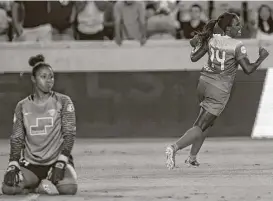  ?? Yi-Chin Lee / Houston Chronicle ?? Dash forward Nichelle Prince (14) celebrates scoring a first-half goal, which ended up standing as the lone goal of the game Saturday in a 1-0 victory over the Boston Breakers at BBVA Compass Stadium.