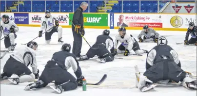  ?? CHRISTIAN ROACH/CAPE BRETON POST ?? The Cape Breton Screaming Eagles are seen stretching at centre ice during a practice session on Tuesday at Centre 200 in Sydney. The Screaming Eagles play the Halifax Mooseheads at Centre 200 tonight at 7 p.m.