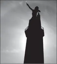  ??  ?? A statue of Vulcan, the Roman god of fire and forge, stands as a symbol of Birmingham’s history as an iron-producing industrial city. The statue was created to represent the city at the St. Louis World’s Fair.