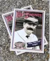  ??  ?? The Sentinel-record/ Tanner Newton
LEFT: Baseball cards featuring the late baseball historian and community leader Mike Dugan were handed out during a ceremony to name Room 105 of the Hot Springs Convention Center in his honor Saturday.