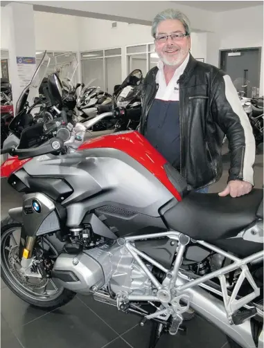  ??  ?? Vancouver BMW Ducati dealer Patrick Visser would be happy to receive more of the ‘ most important’ new BMW R1200GS model he believes riders will lust for.