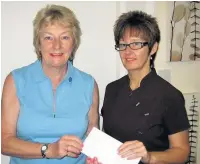  ??  ?? ●●Rochdale Golf Club lady captain Sue Verity with Val Stott from the Beauty Clinic