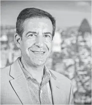  ??  ?? Sandeep Thakrar, president of Neema Hospitalit­y, expects big savings from tax reform but worries about rising rates on loans he took out to grow his hotel chain and climbing gasoline prices.