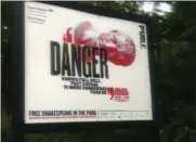  ?? VERENA DOBNIK — ASSOCIATED PRESS ?? In this June 7, 2017 photo, a sign promoting The Public Theater’s production of “Julius Caesar” in New York’s Central Park reads, “Danger knows full well that Caesar is more dangerous than he.”