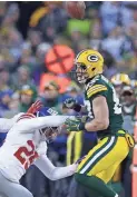  ?? RICK WOOD / MILWAUKEE JOURNAL SENTINEL ?? Jordy Nelson suffered broken ribs when he took a shot from the helmet of Giants safety Leon Hall on Sunday.