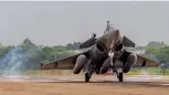  ??  ?? One of the Rafale jets lands at Ambala Air Force Station on Wednesday.