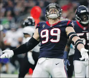  ?? — GETTY IMAGES FILES ?? Texans offensive lineman J.J. Watt might have a tough time getting to Colts quarterbac­k Andrew Luck when the two teams face off on Saturday in Houston.