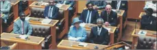  ??  ?? ABOVE: Queen Elizabeth sits next to Nelson Mandela in Parliament, in March 1995.