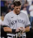  ?? NAM Y. HUH THE ASSOCIATED PRESS ?? New York Yankees infielder DJ LeMahieu was pulled 90 minutes before Tuesday’s game due to wrist discomfort.