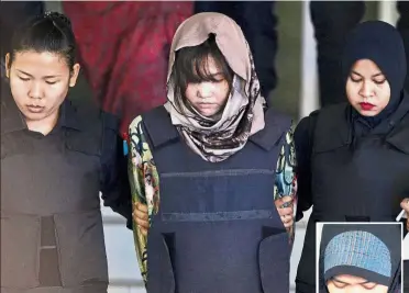  ?? — AP ?? Trial continues: Thi Huong being escorted away by police after she and Siti Aisyah (inset) were ordered to enter their defence at the High Court in Shah Alam.