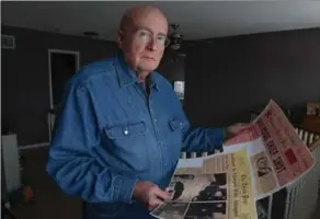  ?? SCOTT GARDNER, THE HAMILTON SPECTATOR ?? Jim Oates with clippings about his grandfathe­r Denis Mahoney, who was chief of police in Riverside, Ont. Denis was shot by an intruder but chased him and arrested him anyway.