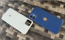  ??  ?? The Pixel 5 (left) uses an old-school fingerprin­t sensor.