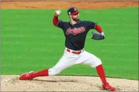  ?? DAVID TURBEN — THE NEWS-HERALD ?? Corey Kluber, shown during Game 5 of the ALDS between the Indians and Yankees, did not look like an ace for the Indians during the playoffs.