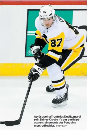  ??  ?? Après avoir affronté les Devils, mardi soir, Sidney Crosby n’a pas participé aux entraîneme­nts des Penguins mercredi et hier. PHOTO AFP