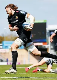  ??  ?? Leading light: Jonny Hill runs in to score Exeter’s second try