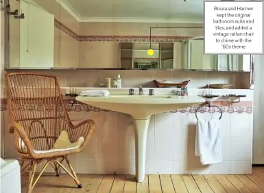  ??  ?? Boura and Harmer kept the original bathroom suite and tiles, and added a vintage rattan chair to chime with the ’60s theme