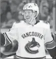  ?? AP PHOTO ?? Vancouver Canucks’ Brock Boeser celebrates after scoring a hat trick during the third period of an NHL hockey game against the St. Louis Blues Sunday.