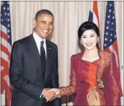  ?? SAKCHAI LALIT/ REUTERS ( POOL) ?? President Barack Obama poses with Thai Prime Minister Yingluck Shinawatra during their meeting Sunday at the Government House in Bangkok.