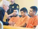  ?? GREG SORBER/JOURNAL ?? Public Defender Jeff Rein talks to double-murder suspects, from left, Eder Ortiz-Parra, Rafael Gonzalez-Parra and Edwin Edsel Ortiz-Parra before their appearance in court Wednesday.