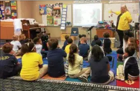  ?? EVAN BRANDT — DIGITAL FIRST MEDIA ?? As the prospects of African Americans improved near the turn of the last century, their music became more hopeful, like Scott Joplin’s Ragtime classic “The Entertaine­r,” Rupert music teacher Sally Foose told her class Monday.