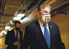  ??  ?? SEN. JOE MANCHIN III (D-W.Va.) found himself at the center of Democratic infighting with his concerns about higher federal unemployme­nt payments.