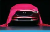  ??  ?? The all-new Mazda CX-5 being unveiled
