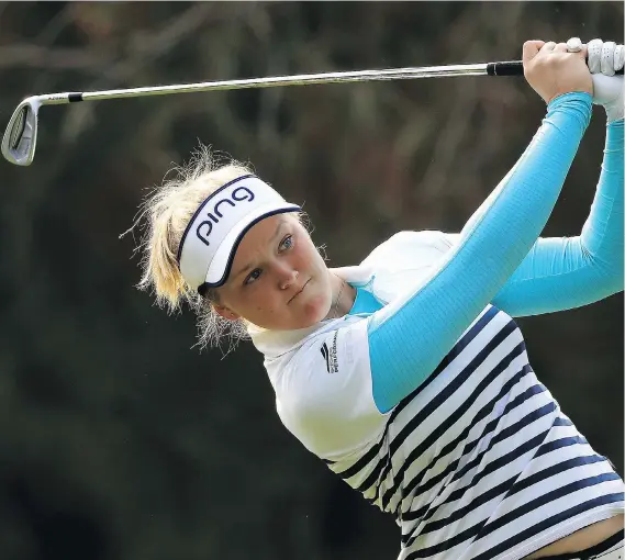 ?? SEAN HAFFEY/GETTY IMAGES ?? After a standout rookie year on the LPGA tour in 2016 that included her first win in a major, Brooke Henderson is working hard to improve in her sophomore year.