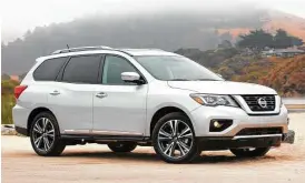  ?? Nissan photos ?? Refreshed for 2017, the seven-passenger Pathfinder is bolder, more aerodynami­c and safety features such as adaptive cruise control and forward emergency braking are available or standard.