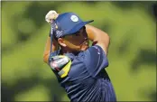  ?? CARLOS OSORIO — THE ASSOCIATED PRESS ?? Rickie Fowler hits from the 18th tee during the first round of the Rocket Mortgage Classic on Thursday at the Detroit Golf Club in Detroit.