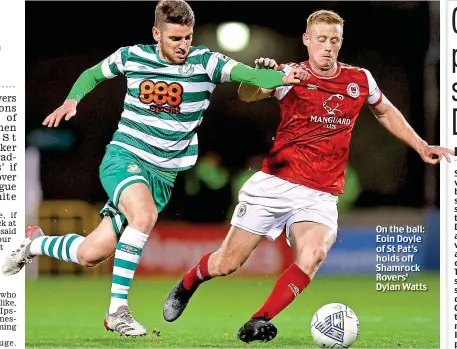  ?? ?? On the ball: Eoin Doyle of St Pat’s holds off Shamrock Rovers’ Dylan Watts