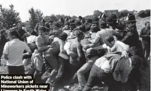  ?? ?? Police clash with National Union of Mineworker­s pickets near Llanwern in South Wales