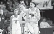  ?? FRANK FRANKLIN II/AP ?? Connecticu­t’s Crystal Dangerfiel­d (5) and Katie Lou Samuelson (33) celebrate a 3-point basket by Gabby Williams.
A&M
84: