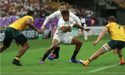  ?? Photograph: David Rogers/Getty Images ?? Anthony Watson scored a late try against Australia in their quarter-final victory.