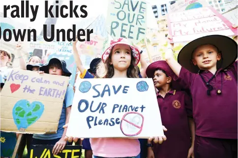  ?? — Reuters photo ?? School students take part in the global #ClimateStr­ike rally in Brisbane, Australia.