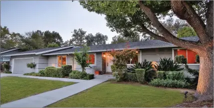  ??  ?? The single-story ranch-style home spreads over almost a third-acre level lot with more than 2,200 square feet of living space.