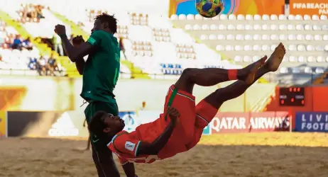  ??  ?? A file photo of Oman’s Sharif al Balushi attempting an overhead kick during their match against Nigeria at the 2019 FIFA Beach Soccer World Cup in Asuncion, Paraguay