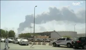  ?? AP/Al-Arabiya ?? Smoke from the Abqaiq oil processing facility fills the sky Saturday in Buqayq, Saudi Arabia.