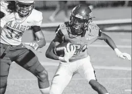  ?? Shotgun Spratling For The Times ?? DONJ’RAEL BROOKS, looking for extra yards after catching a pass in Thursday’s opener against La Habra, is trying to make up for time lost to injuries.