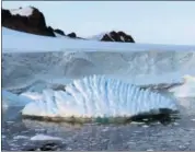  ?? ANDREW SHEPHERD — UNIVERSITY OF LEEDS VIA AP ?? An unusual iceberg near the Rothera Research Station on the Antarctic Peninsula.