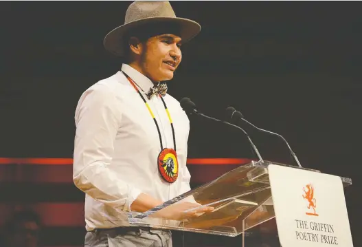  ??  ?? Edmonton poet Billy-ray Belcourt, here accepting the Griffin Prize in 2018 for his first book of poetry, says he has “feelings of joy and gratitude” after being recognized for his second book.