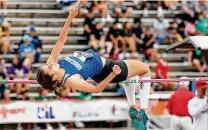  ?? Marvin Pfeiffer / Staff photograph­er ?? New Braunfels junior Abigail Morrow clears 5-feet-8 to take second place in the 6A girls high jump at Myers Stadium.