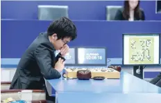  ?? — AFP ?? This photo taken on May 25 shows China’s 19-year-old Go player Ke Jie preparing to make a move during the second match against Google’s artificial intelligen­ce programme AlphaGo in Wuzhen, eastern China’s Zhejiang province.