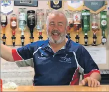  ?? ?? John ‘Yo-Yo’ McAlpine behind the bar at Tarbert Bowling Club.