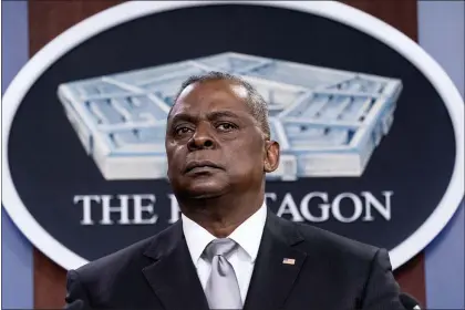  ?? ALEX BRANDON — THE ASSOCIATED PRESS FILE ?? Secretary of Defense Lloyd Austin listens to a question as he speaks during a media briefing at the Pentagon in Washington, in this Friday, Feb. 19, 2021, file photo. U.S. Defense Secretary Lloyd Austin met Sunday, April 11, 2021, in Tel Aviv with his Israeli counterpar­t and reinforced American support.