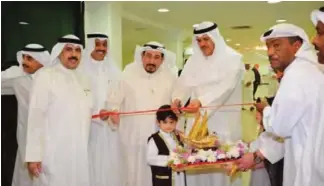  ??  ?? KUWAIT: Sheikh Salman cutting the ribbon to open the diwaniya named after him.