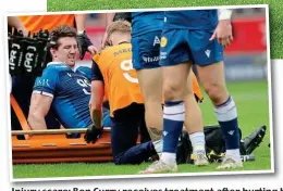  ?? GETTY IMAGES ?? Injury scare: Ben Curry receives treatment after hurting his hamstring, making him a doubt for the World Cup