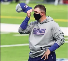  ?? Harry How / Getty Images ?? Giants coach Joe Judge is one of several first-year coaches struggling to win games this season.