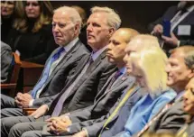  ?? Bonnie Cash/Bloomberg ?? President Joe Biden and House Speaker Kevin McCarthy, R-Caif., second from left, appeared together Thursday at the National Prayer Breakfast at the Capitol.