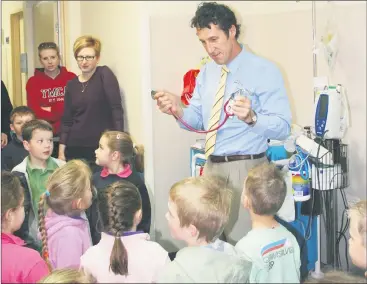  ??  ?? DEPARTING: Nick Bush, pictured leading a tour of kindergart­en children through East Grampians Health Service, is shifting to Echuca.